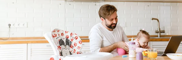 White Father Smiling Playing His Daughter While Using Laptop Home — Stock Photo, Image