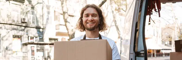 Young White Cafe Worker Apron Taking Delivery Outdoors — Stock Photo, Image