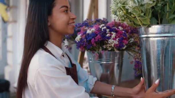 Side View Smiling African Woman Waiter Putting Flowers Pots Entering — Stock Video
