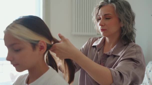 Positive Gray Haired Young Mom Braiding Her Dyed Hair Daughters — Stock Video