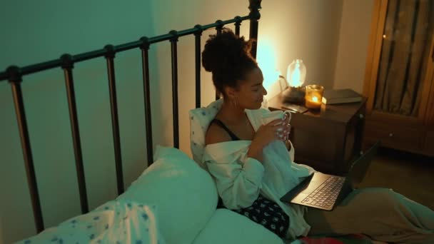 Hopeful Woman Texting Laptop Drinking Tea Lying Bed Home Evening — Stock Video