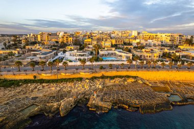 Marsaskala waterfront at sunrise, Malta. Aerial Drone View.