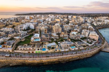 Marsaskala townscape at sunrise, Malta. Aerial drone view.