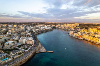 Marsaskala townscape at sunrise, Malta. Aerial drone view.