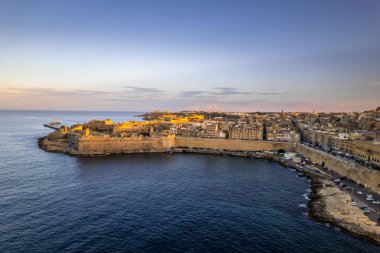 Aerial drone skyline of Valletta at sunset, Malta.