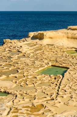 Traditional salt pans in Xwejni Bay on the island of Gozo, Malt