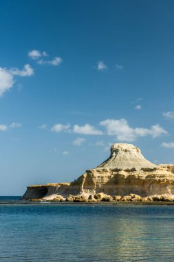 Xwejni Bay in Malta. Pristine beach and rock formations.