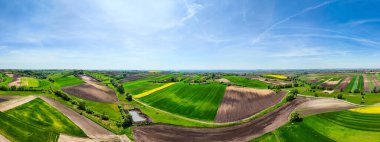 Beautiful farmland and coutryside in Ponidzie, Poland. Aerial drone view' clipart