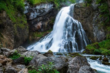 Breathtaking View of Gollinger Waterfall in the Austrian Alps clipart