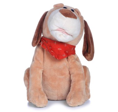 Beyaz zemin izolasyonunda yumuşak oyuncak köpek