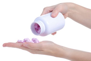 Pembe haplı beyaz kavanoz, kapsül, çocuk vitamini hayvan ilaçları ilaç eczanesi beyaz arka plan izolasyonu