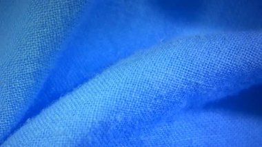 Mavi pamuk keten kumaş kumaş kumaş doku bulanık arka plan makro