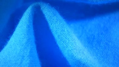 Mavi pamuk keten kumaş kumaş kumaş doku bulanık arka plan makro