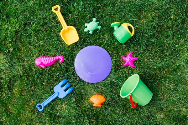 Childhood Summer Concept Close Sand Toys Kit Green Lawn Grass — Stock Photo, Image