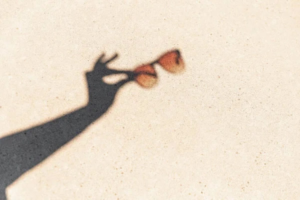 Summer Silhouette Concept Shadow Hands Holding Sunglasses Concrete Background — Stock Photo, Image