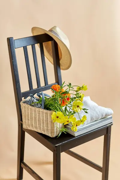 Home Decor Design Concept Flowers Basket Clothes Hat Magazines Vintage 스톡 사진
