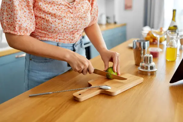 Drinks People Concept Close Woman Cutting Lime Knife Making Cocktail Stock Image