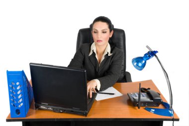 Business woman working on laptop at office clipart