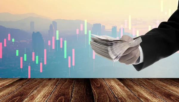 Politicus Stimuleren Economie Concept Geld Hand Met Grafiek Stad Achtergrond — Stockfoto