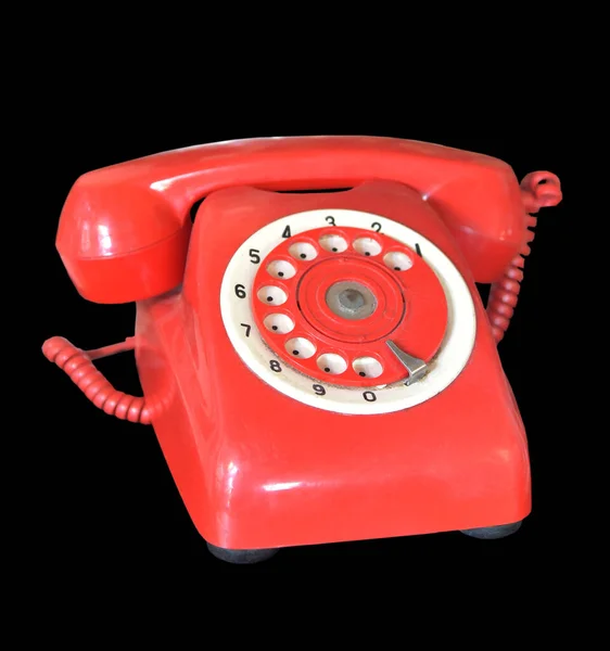 黒の背景に隔離された赤のヴィンテージ電話 — ストック写真