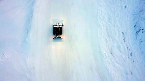 Aerial View Snowcat Working Frozen Snow Slope — Video Stock