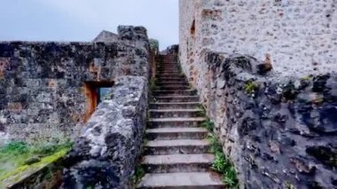 Staircase of the medieval castle wall, moving upstairs on the fortification