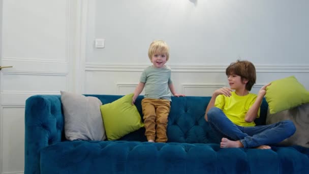 Pillow Fight Two Boys Have Fun Pillows Sitting Couch Home — Wideo stockowe