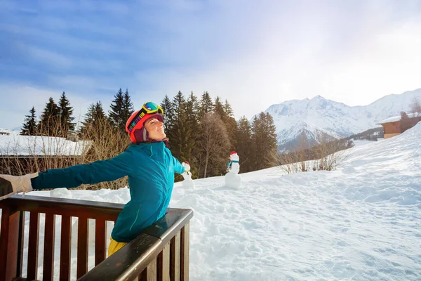 Woman Stand Balcony Stretching Hands Relaxed Wearing Helmet Snowman Mountain — Fotografia de Stock