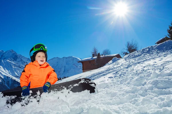 Happy Little Snowboarder Boy Alpine Ski Track Sit Wearing Helmet — Fotografia de Stock