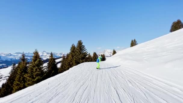 Child Ride Ski Slope Downhill Beautiful Mountain Range Panorama French — Stock Video