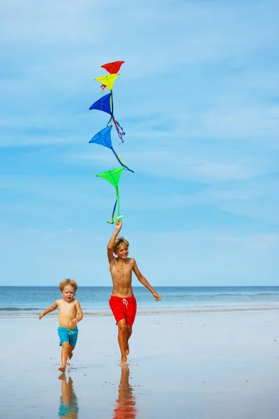 Two Happy Kids Boys Run Holding Many Colorful Kites Beach — Fotografia de Stock