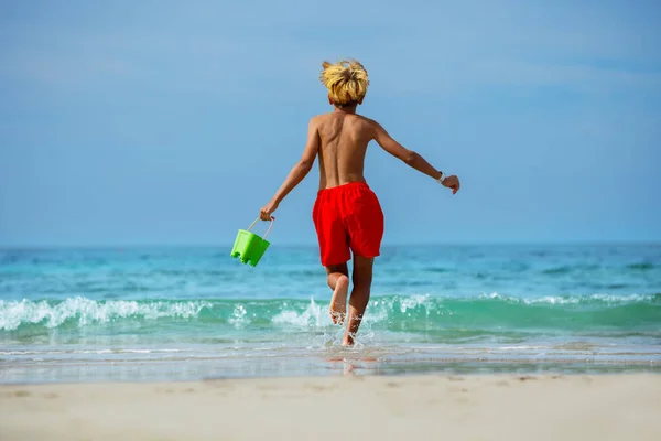View Blond Boy Run Ocean Waves Sand Beach Carry Toy — Fotografia de Stock