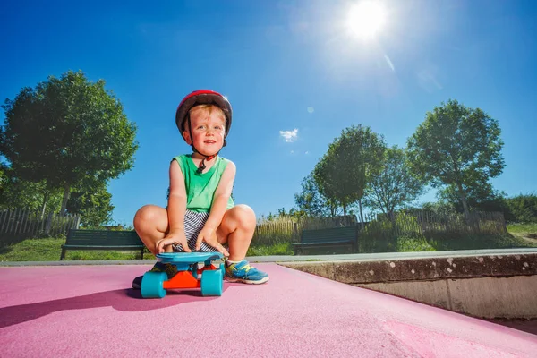 Smiling Handsome Little Boy Sit Skate Playing Skatepark Wearing Helmet — Stock Photo, Image