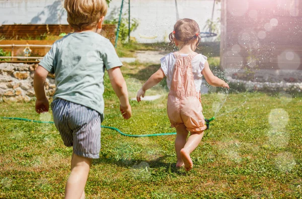 Fun Hot Summer Day Two Kids Boy Girl Run Water — Stock Photo, Image