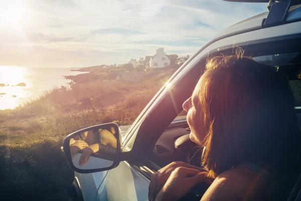 Woman Looking Ocean Sunset Sitting Driver Seat Leaning Car Door — Stockfoto
