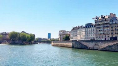View from on river in Paris in France on sunny summer day