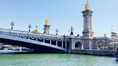 View from the boat on Pont de Sully bridge near Notre Dame, Paris in France on sunny summer day