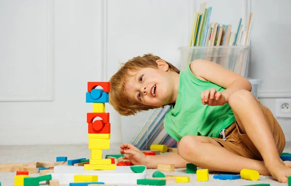 Laughing Little Boy Sitting Carpet Living Room Look His Toy — Stock Photo, Image