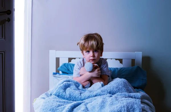 Little Blond Calm Boy Sit Bed Holding Plush Toy Covered — Stock Photo, Image