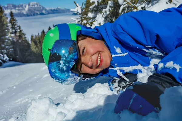 Close Portrait Laughing Young Boy Ski Helmet Mask Laying Snow — Stock Photo, Image