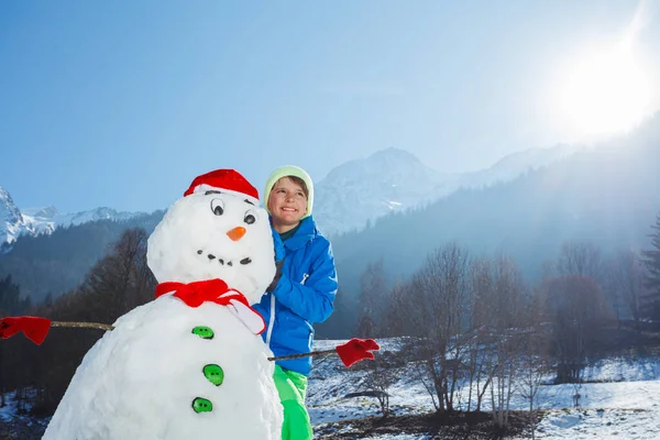 Handsome Young Boy Winter Sport Outfit Stand Freshly Build Snowman — Stock Photo, Image