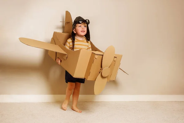Cute Young Boy Stand Holding Self Made Cardboard Plane Wings — Stock Photo, Image