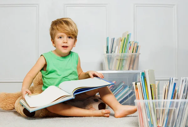 Young Boy Blond Hair Looking Camera Sitting White Carpet Library — Stock Photo, Image