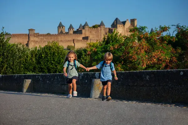 Happy Kids Holding Hands Run Bridge Carcassonne Castle Background Excited — Stock Photo, Image