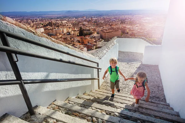 Two Kids Backpacks Climb Hill Reaching Viewpoint Admire Alhambra Ancient — Stock Photo, Image
