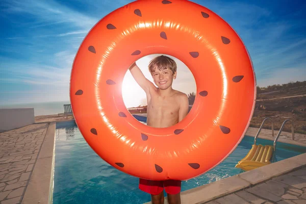 Cheerful Young Teenager Crimson Swimming Shorts Poses Vibrant Orange Swim — Stock Photo, Image