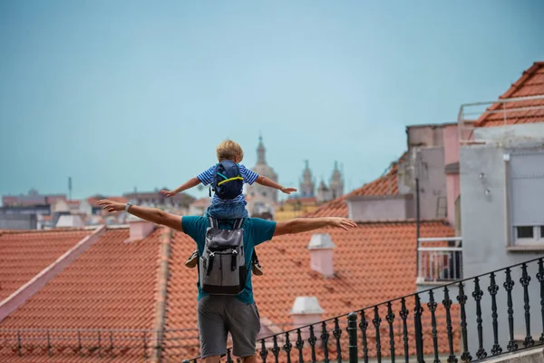 Father Son Enjoy Summer Lisbon Sightseeing Stretching Arms Flying Gesture Stock Image