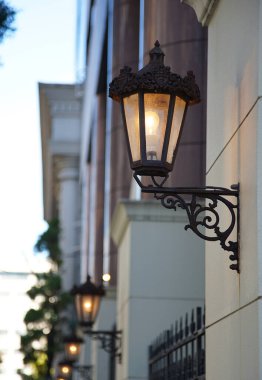 Streetlight of the wall of the building of the street of the town                            