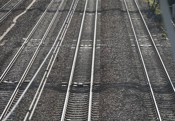  Parallel laid rails on railway tracks on a sunny day                              