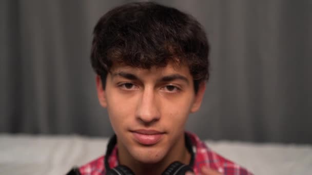 Young Arab Student Sits Floor Night College Dormitory Puts Headphones — Stok video